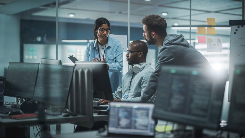 People gathered round computers