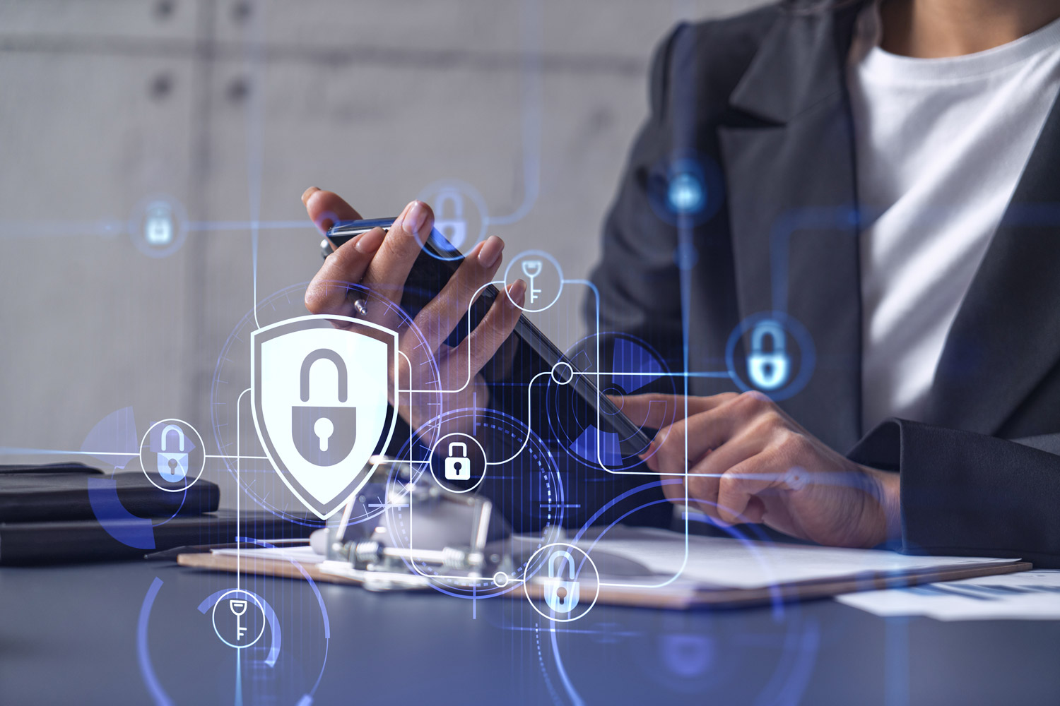 A businesswoman in formal wear checking the phone to sign the contract to prevent probability of risks in cyber security.